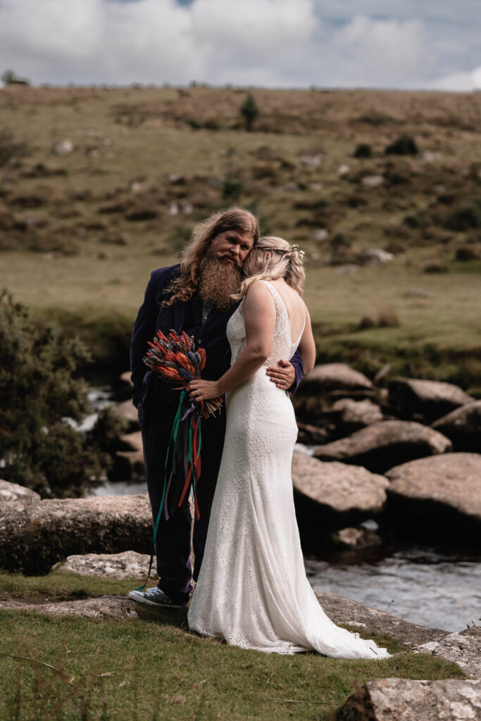 Documentary-style wedding photography of the bride and groom having an intimate time together