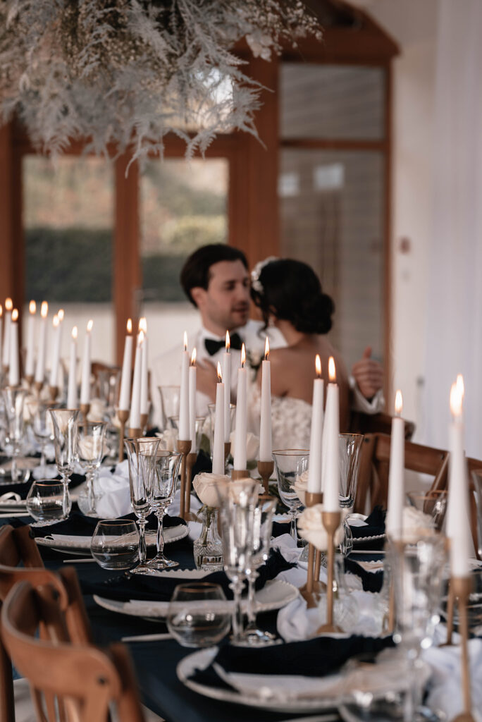 The bride and groom inside of their wedding venue in Somerset sharing an intimate moment together