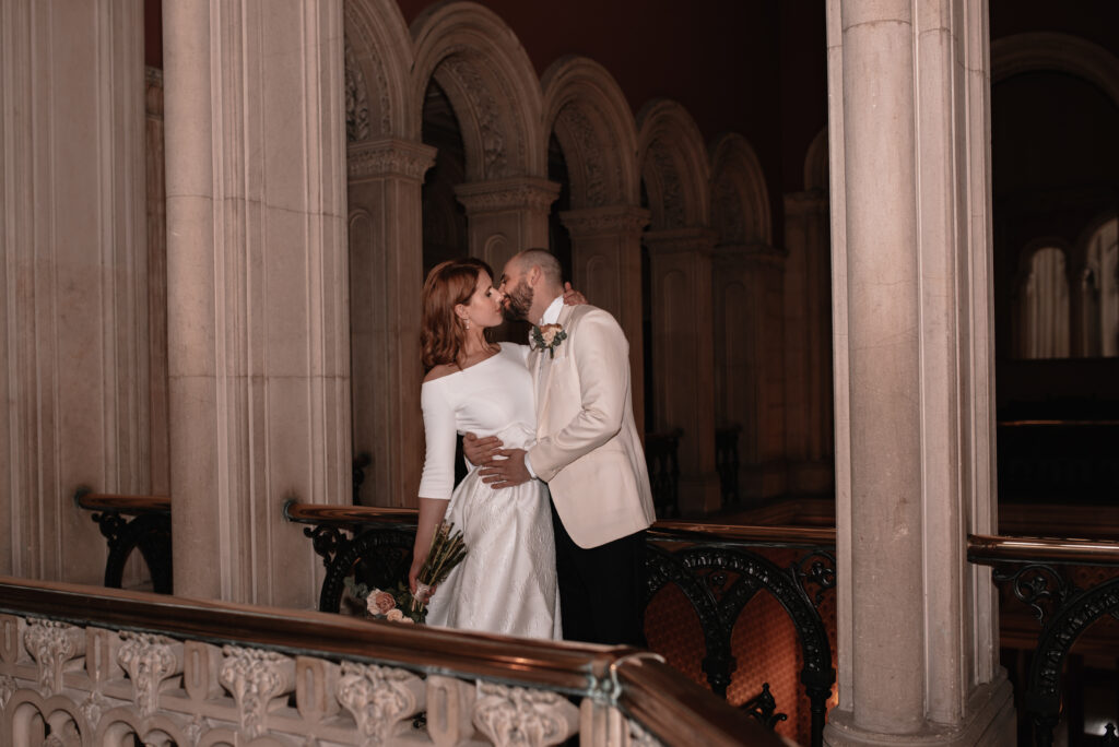 The bride and groom inside of their wedding venue in Somerset capturing portraits