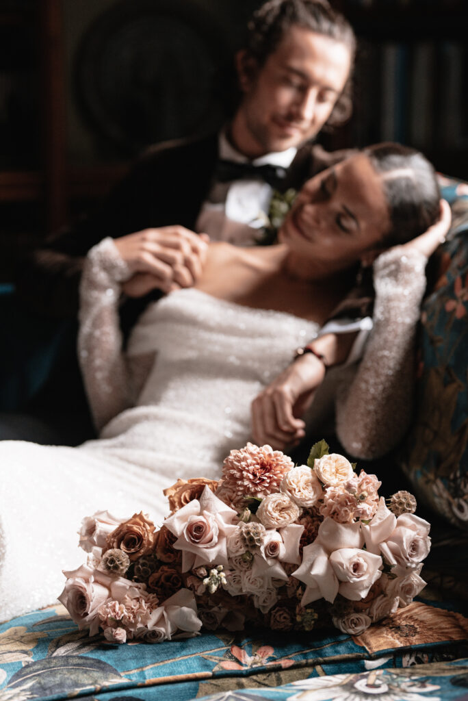 The bride and groom inside of their wedding venue in Somerset sharing an intimate moment together