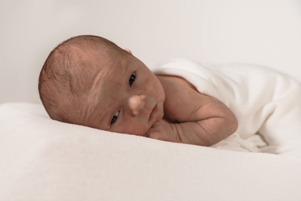 Newborn photography of baby awake