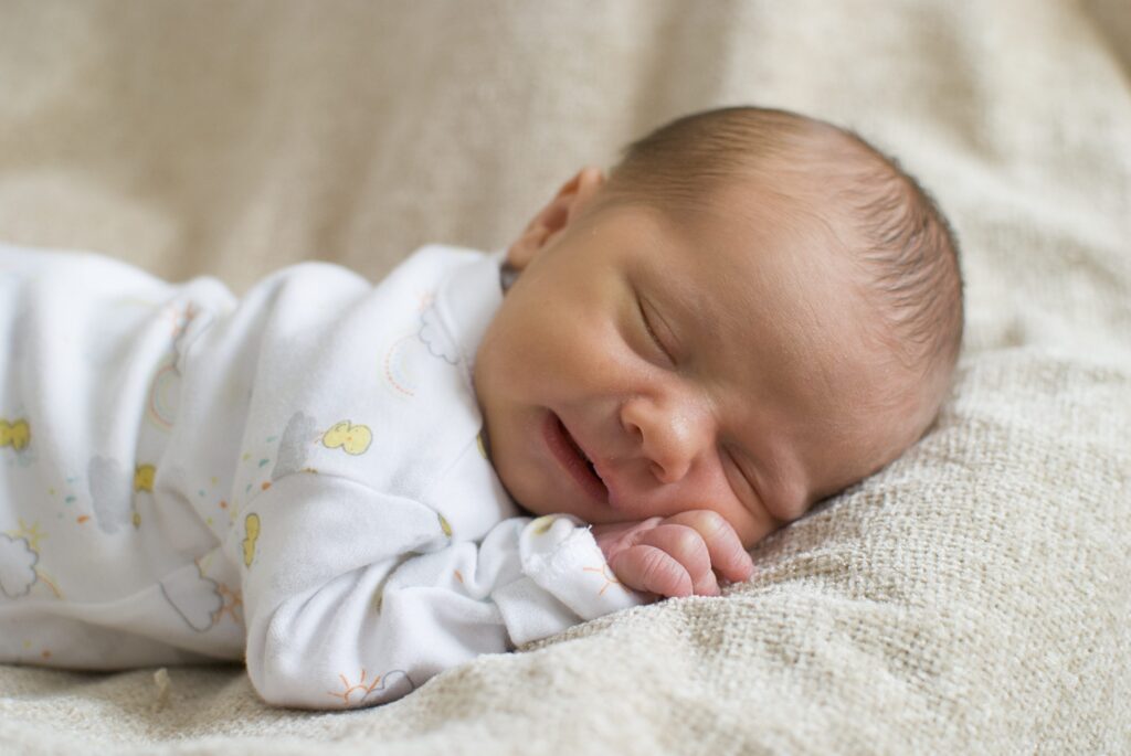 In-home newborn photography of baby sleeping