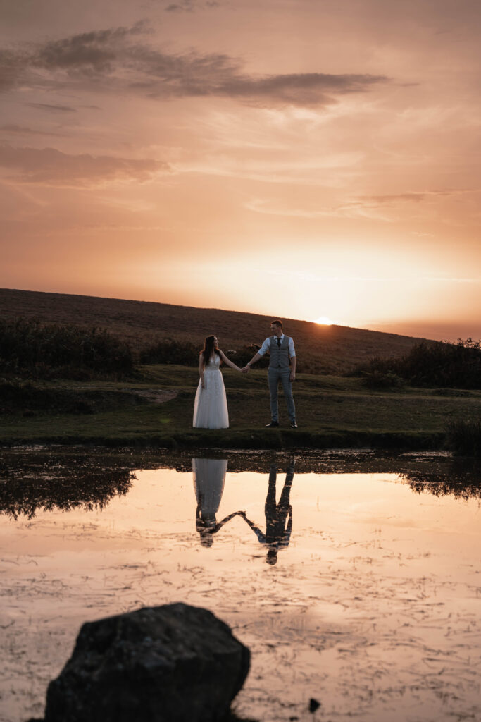 The bride and groom having portraits together during golden hour which was scheduled into their wedding day timeline
